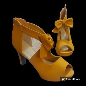 Golden yellow faux suede heels